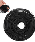 Hand holding Rubber Drive Belt Set for DVD CD VCR and Cassette Players 56 pcs replacement belts in black 40 to 120mm range
