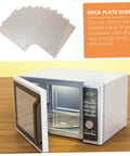12 Piece Mica Sheet Waveguide Covers For Microwave Oven with High Temperature Heat Resistant Insulation displayed next to open microwave