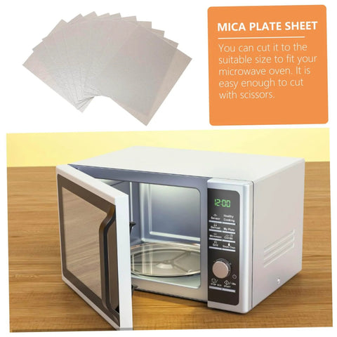 12 Piece Mica Sheet Waveguide Covers For Microwave Oven with High Temperature Heat Resistant Insulation displayed next to open microwave
