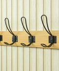 Super Sturdy Wall Mounted Coat Rack With Four Heavy Duty Hooks To Keep Clutter In Check Holds jackets and bags beautifully.