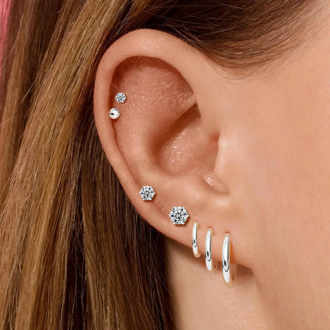 Surgical Steel Earrings Set For Multiple Piercings Nine Pairs Featuring Hoops CZ Studs And Ball Studs For Women Hypoallergenic 20G Dope Everyday Wear Must Have Jewelry With Three Styles And Sizes, worn on ear