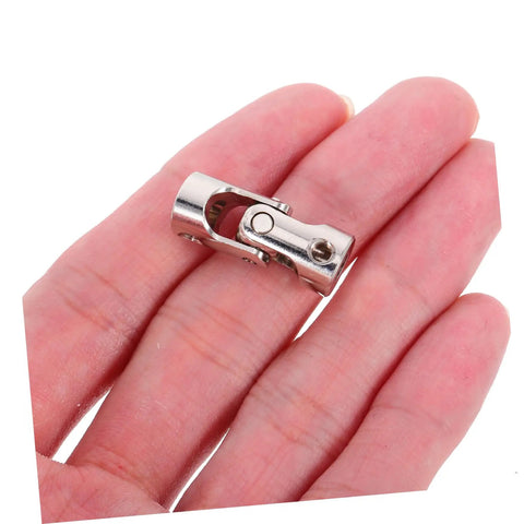 Premium Stainless Steel Joint Coupling Adapter For Model Cars And Ships Featuring Four Mm Flexible Drive Shaft Connector With Robust Motor Shaft Precision Engineering And Easy Installation For Smooth Reliable Power Transfer Every Time, stainless steel 4mm joint coupler in hand