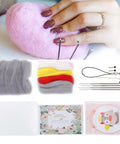 Beginner Friendly Wool Felting Kit With Safe Tools And Storage Box Easy Fun Craft For Making Cute Animal Plush Dolls 113 Piece Energy Angel And Devil Theme Fiber Arts Supplies For Kids And Adults. pink wool felting tools, foam mat, needles, and kit parts