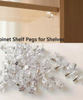 Clear Shelf Pegs 30 Pack 5mm Transparent Cabinet Support Holders visible in arrangement on surface with one installed in wood.
