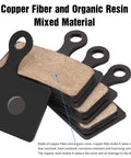 Four Pairs Bicycle Disc Brake Pads For Mountain Bike Riders showing copper fiber and organic resin layers