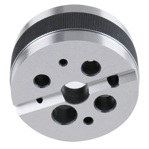 Machinist Bench Block 3 Inch Diameter 1.5 Inch Height Hardened Ground Steel With 1/8 to 5/8 Inch Holes Knurled Edge For Secure Grip V Groove Across Face For Round Stock Pin Driving And Drilling, front view