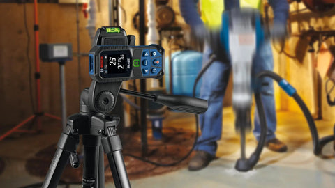 Blaze Green Beam Laser Distance Measure With 165 Foot Range And One Sixteenth Inch Accuracy on tripod in workshop