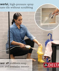 Woman cleaning tile with ProClean Handheld Shower Head With High Pressure Spray 6 Settings Brushed Nickel SpotShield Finish