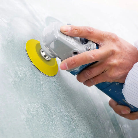 Hand using power tool with 2 Inch Hook And Loop Sanding Pad For Sanding Discs With Quarter Inch Shank Drill Attachment And Soft Foam Buffering Pad