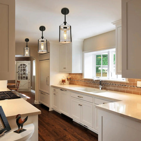 Farmhouse Pendant Light With Seeded Glass And Metal Cage, Rustic Wood Finish Island Lighting Fixture for kitchen shown over island.