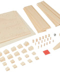 Wooden Maze Ball Puzzle Kit For Family Fun Totally Handcrafted In Hokkaido From Raw Wood To Finish pieces laid out on table