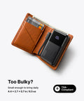 Throw This Compact 10000 Mah Power Bank In Your Pocket For Immediate Relief Packs 45W Usb C Pd Fast Charge For Phones Consoles And Laptops in a brown wallet.