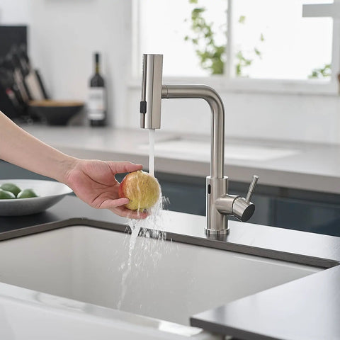 Slick Hands Free Kitchen Sink Faucet With Pull Down Sprayer And Waterfall Flow featuring 360 Degree swivel design rinsing an apple.