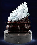 Aqur2020 Electric Rotating Display Stand For Jewelry With Three Speeds And Four Angle Settings showcasing ornate sculpture on a sleek black base.