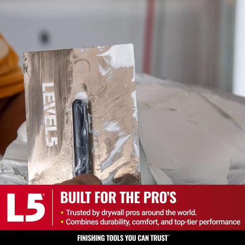 Rugged 12 Inch By 4.75 Inch Flat Drywall Trowel With 0.7mm Triple Hardened Stainless Steel Blade in action.