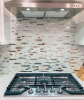 Modern Iridescent Glass Metal Mosaic Tile Backsplash For Kitchen And Bathroom White Silver Linear Wall Tiles For Shower Fireplace And Accent Wall 5 Square Feet behind stovetop