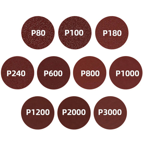 Assorted grits of Three Inch Sanding Discs Kit 100 Pieces 80 To 3000 Grit Hook And Loop Quick Change Pads displayed