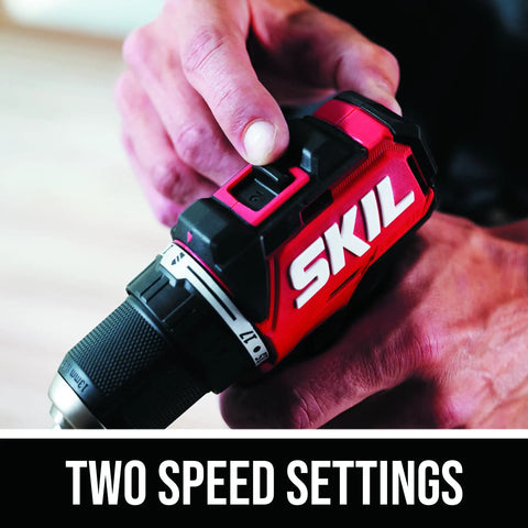 Person adjusting two speed settings on 12V Brushless Cordless Half Inch Compact Drill Driver Kit With 2.0Ah USB C Battery.