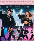 Dancers performing in stylish outfits with pulsating neon lights, demonstrating features of the 5K 75MP Autofocus Vlogging Camera.