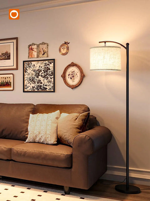 Floor Lamp With 3 Color Temperatures 3000K 4500K 6500K, Linen Lampshade, 9W LED Bulb Included, Black Base Beige Shade next to sofa