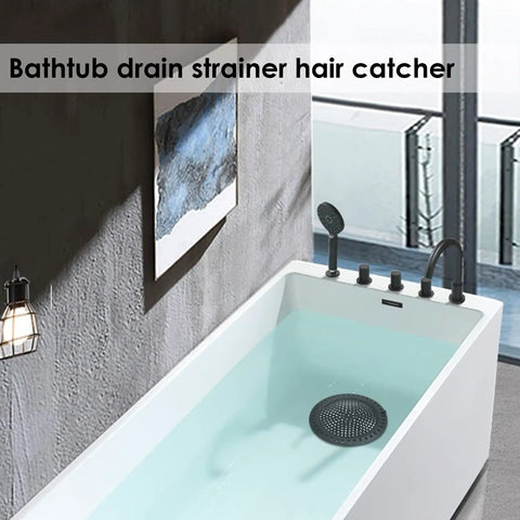 Heavy Duty Hair Catcher Shower Drain Protector And Tub Filter For Bathtub And Sink Made From Top Quality Stainless Steel With Gentle Silicone Border in a modern bathtub