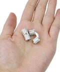 Brass Concealed Barrel Hinge Set For Cabinets And Jewelry Boxes With 180 Degree Opening Hidden Hinges For Wooden Boxes And Furniture 8mm Diameter Pack Of 8 Coshar shown in a hand.