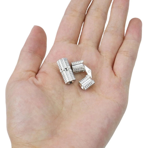 Brass Concealed Barrel Hinge Set For Cabinets And Jewelry Boxes With 180 Degree Opening Hidden Hinges For Wooden Boxes And Furniture 8mm Diameter Pack Of 8 Coshar shown in a hand.