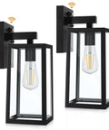 Bad Boy 13 Inch Dusk To Dawn Sensor Outdoor Wall Lights Large Wall Sconce 2 Pack with black metal finish and clear glass bulbs.