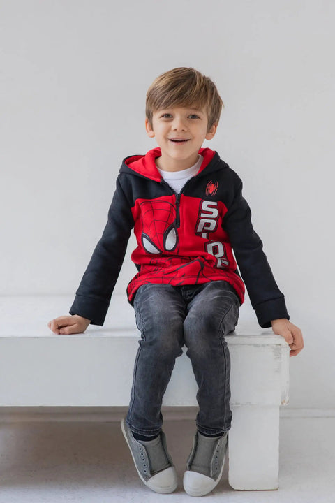 Little Boys Spider-Man Fleece Half Zip Hoodie Red And Black Size 7 Cozy Soft Hooded Sweatshirt Officially Licensed With Easy On Off Zip Ribbed Cuffs And Hood Lining Plus Screen Printed Hero Graphic For Play And School worn by child sitting on white bench