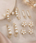 8Pcs Pearl Waist Tightener Pins For Jeans And Skirts Skip The Belt Instant Cinch Clips With Durable Alloy Frame decorative clips displayed on fabric background.