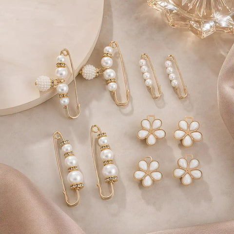 8Pcs Pearl Waist Tightener Pins For Jeans And Skirts Skip The Belt Instant Cinch Clips With Durable Alloy Frame decorative clips displayed on fabric background.