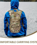 Person wearing Rugged Mountaineering Backpack With Large Capacity And Multiple Compartments Heavy Duty Oxford Cloth Travel Bag