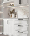 Image of 2 Pack Black Square Bar Cabinet Pulls With Slick Matte Finish For Kitchen And Bathroom Cabinets And Cupboards Center To Center 12.6in (320mm) Hollow Yet Durable Stainless Steel Hardware Easy Install Goldenwarm installed on white kitchen cabinets.
