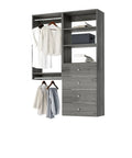 Fully Assembled Grey Closet Organizer Kit With Double Hanging Rods, Shelves, And Drawers As A 54 Inch Corner Unit displaying clothes and storage.