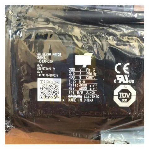 AC servo motor SGM7J-04AFC6E, 400W, black packaging.