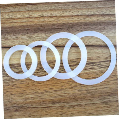 Silicone Gasket Replacement Set 10 Pieces For Coffee Pot Lids And Jar Seals on wood surface
