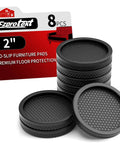 Tough Non Slip Furniture Pads For Hardwood Floors 8 Pack 2 Inch Anti Skid Floor Guards With Grippy Tpu Casters, black pads stacked.
