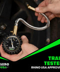 Rhino USA tire pressure gauge with braided stainless hose and brass fitting; 0–75 psi, 2-inch glow dial, front view