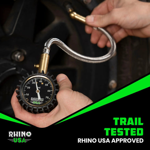 Rhino USA tire pressure gauge with braided stainless hose and brass fitting; 0–75 psi, 2-inch glow dial, front view