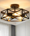 Modern Farmhouse Hexagon Cage Ceiling Light Semi Flush Mount In Matte Black installed in a room, hexagonal metal cage design
