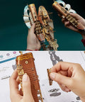Person assembling Ultimate 3D Wooden Puzzle Kit For DIYers, Handcrafted Spaceship Model, Steampunk Airship Build With 400 Plus Precision Cut Parts