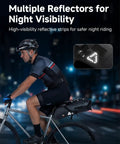 Cyclist using Expandable 13L-15L Waterproof Bikepacking Saddle Bag for Road, Mountain, and E-Bikes with Roll-Top Closure at night
