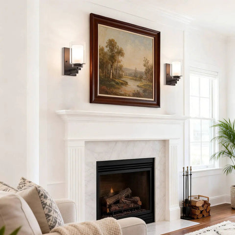 Living room with dark bronze vanity wall light, dual glass shades, transitional fixture above fireplace, modern classic mount