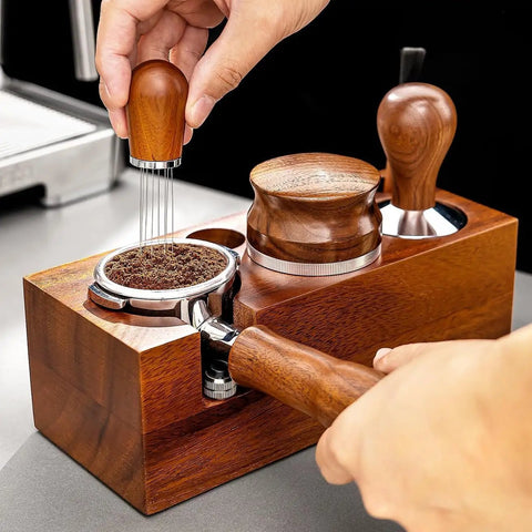Kickass Espresso Organizer And Height Adjustable Tamping Station For 51mm 54mm And 58mm Portafilters Solid Wood Coffee Counter with tamper preparing ground coffee.