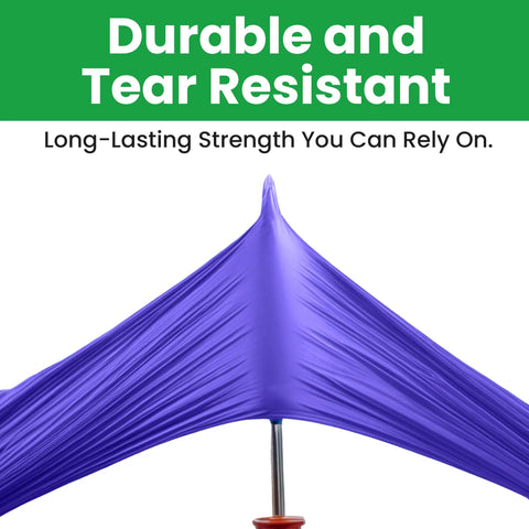 Purple canopy fabric stretched over a central metal pole with orange knob.