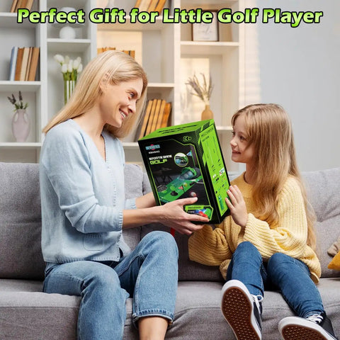 Parent and child with Upgraded Kids Golf Set With Dinosaur Automatic Returner Light Up Night Golf Balls 3 Clubs Kit box.