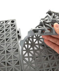 Close-up of Interlocking Cushion PVC Flooring Tiles Set 12x12 Inches No Slip Drainage Mats being assembled, showing interlocking edges.