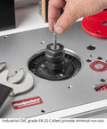 Close-up of Beefy 3.25HP CNC Router Motor being adjusted with ER20 collet for precise woodworking in router lift setup.