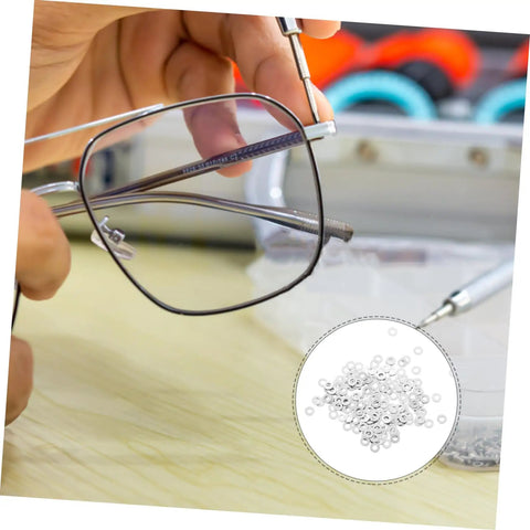 200Pcs Eyeglass Flat Washers Gaskets For Rimless Frames Metal Fasteners shown with glasses repair tool