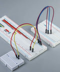 16 Piece Breadboard Kit With 400 Tie Points Solderless Prototyping PCBs For Arduino DIY Projects shown with jump wires connected